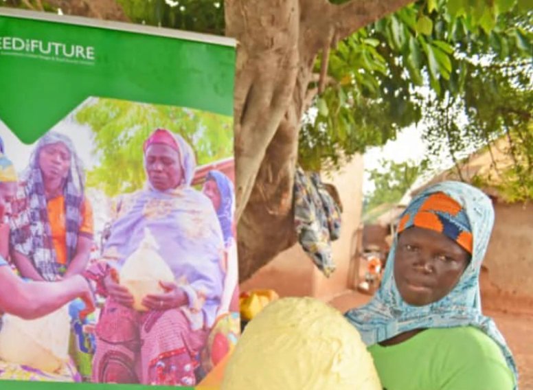 Women shea producers with their shea butter at a YomTrace community hub